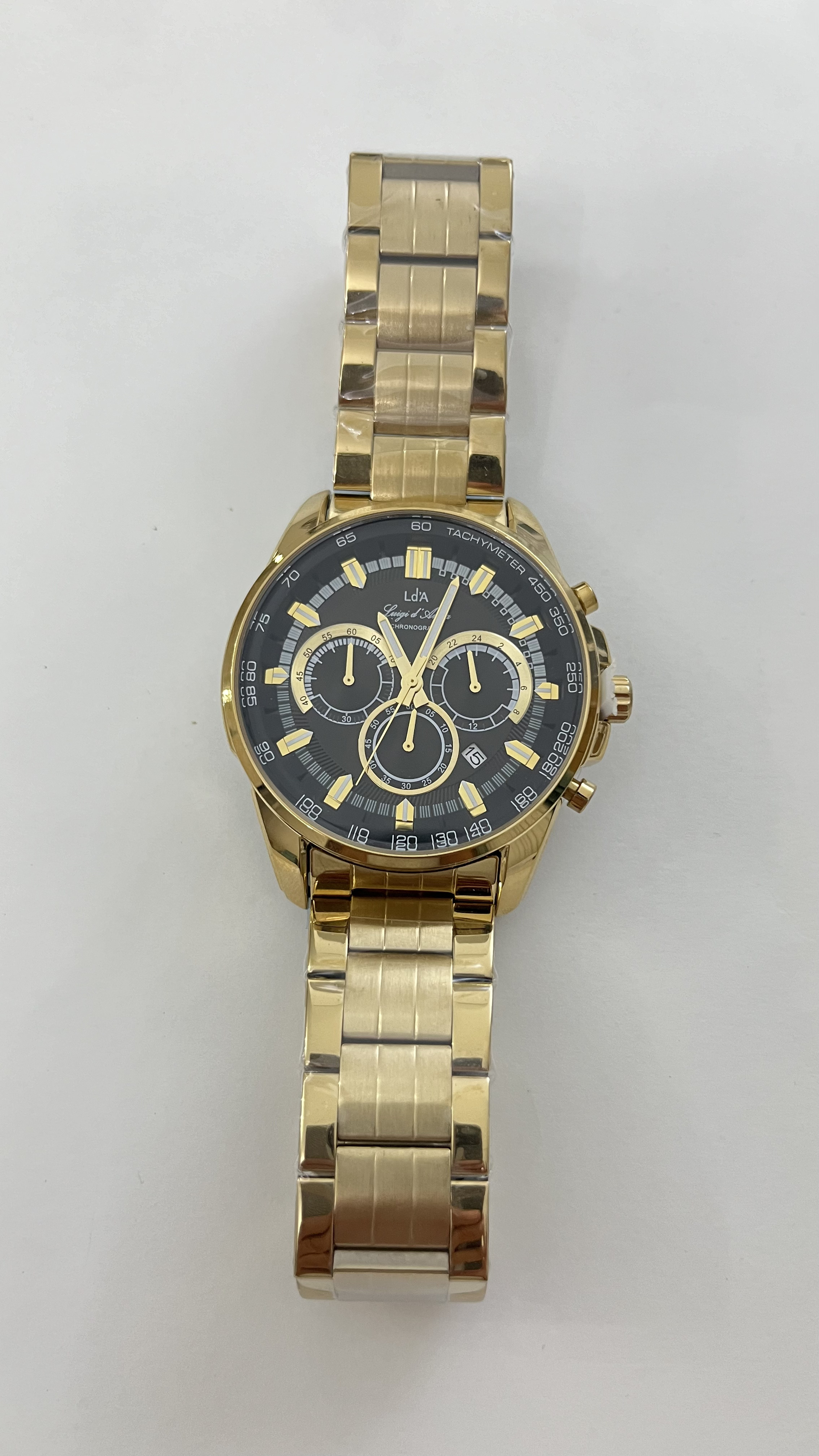 ساعت مچی سه موتوره قاب وبند طلایی تقویم دار