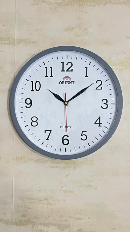 ساعت دیواری اورینت گرد آرامگرد