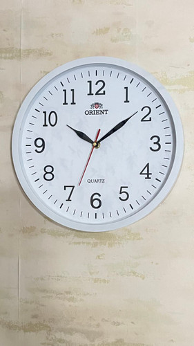 ساعت دیواری اورینت گرد آرامگرد