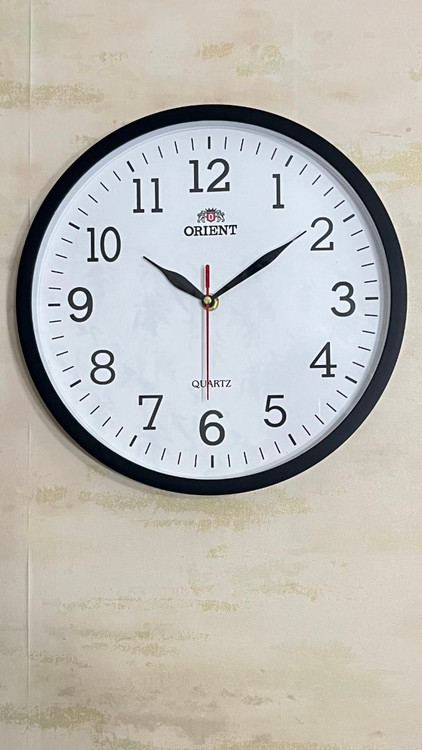 ساعت دیواری اورینت گرد آرامگرد